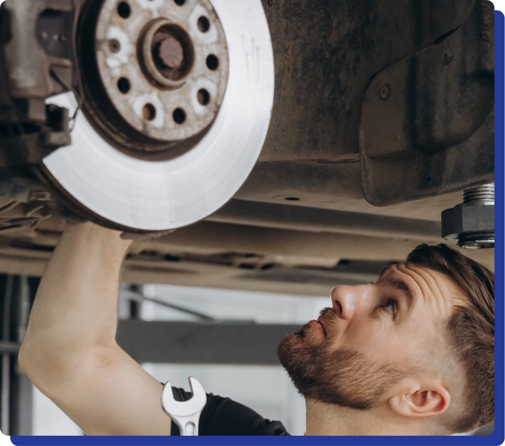 Vehicle Inspections in Kodiak, AK at Midtown Auto Repair Services. a man working under a car